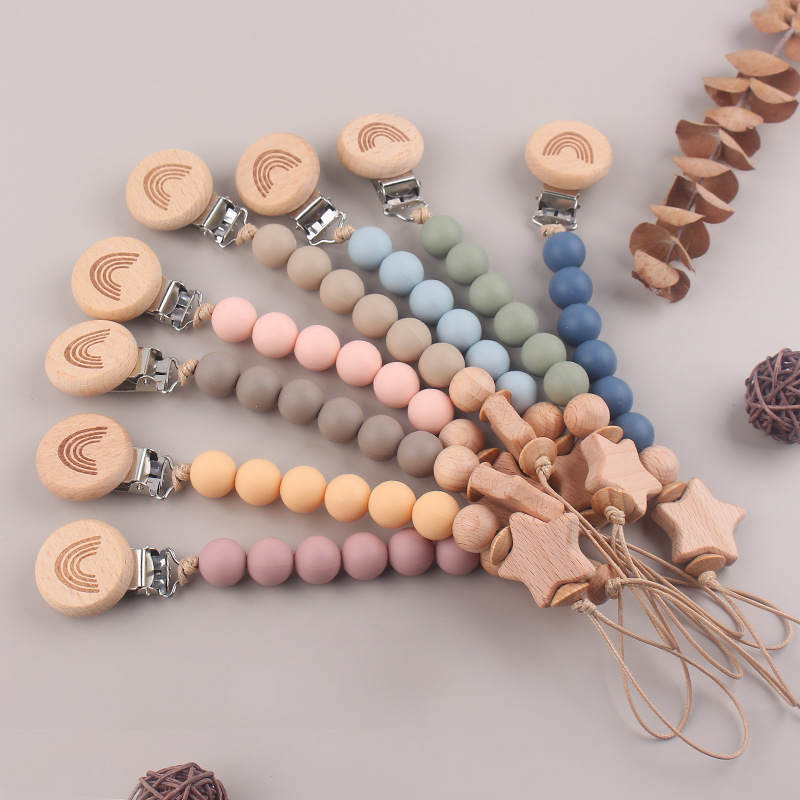 Productos para bebés y niños pequeños clip de tetina de beech DIY estrella de penta de beech creativa perlas de silicona calmante tetina cadena anti-caída cadena