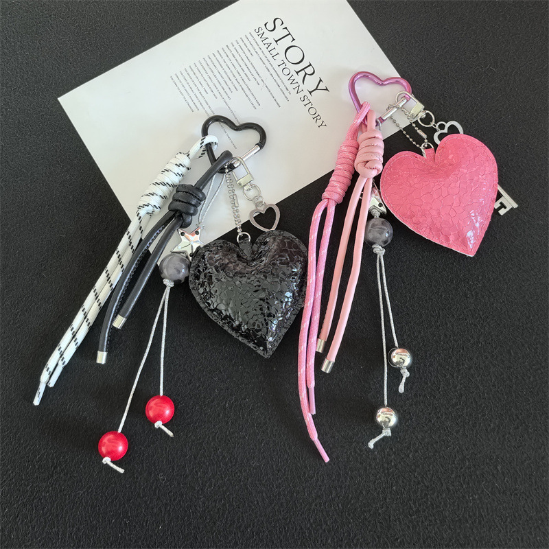 Cross-border personality PU leather love keychain women's bag pendant creative school bag key chain pendant accessories wholesale Cross-border personality PU leather love keychain women's bag pendant creative school bag key chain pendant accessories wholesale