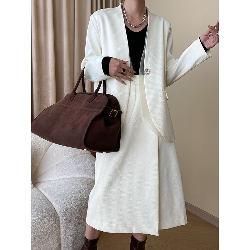 司南高阶通勤风纹理感网纱拼接西装外套半身裙两件套装