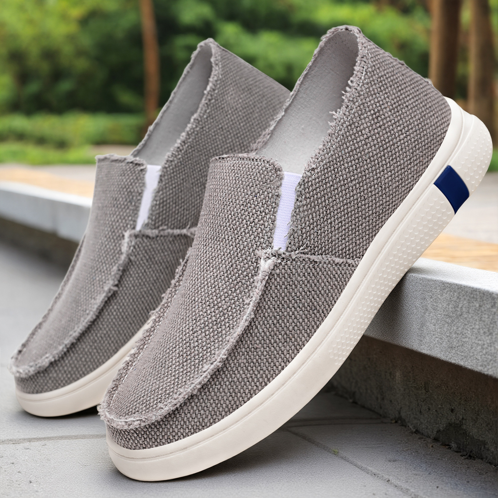 Zapatos de hombre de primavera zapatos de tela de tamaño grande zapatos de hombre zapatos ligeros con suela suave cómodos zapatos casuales superficiales zapatos de skate