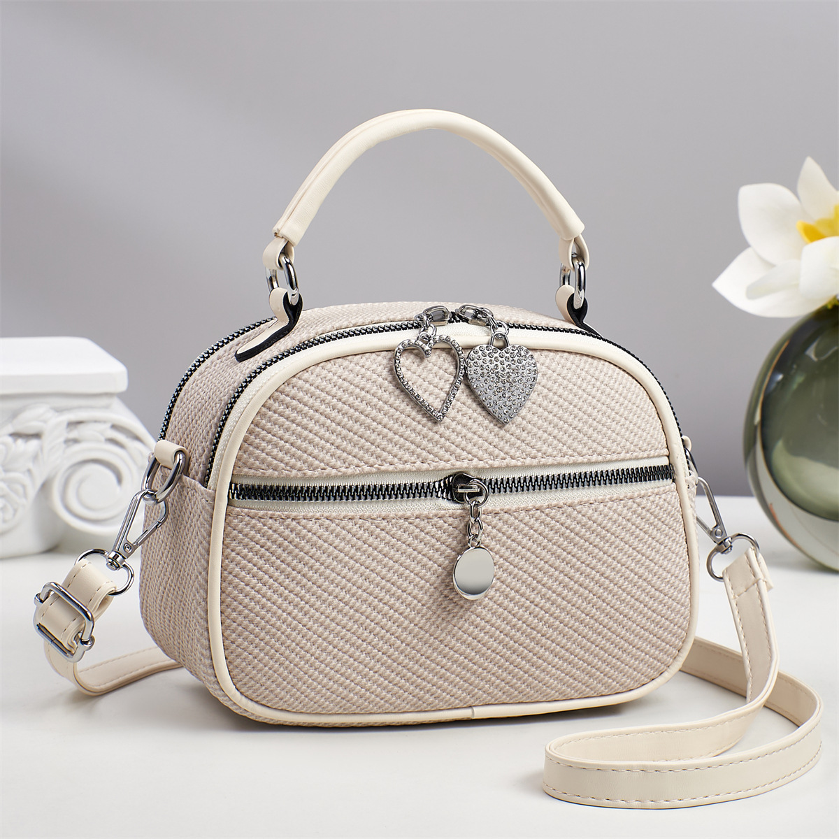 2025 bolsos de mano exquisitos bolsos de tela texturizados de hombro casuales bolsos transfronterizos