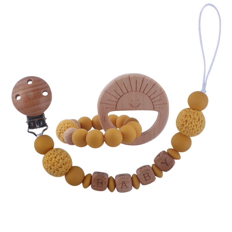 Bebé suministros de dibujos animados de haya animal pulsera de silicona DIY nombre calmante bebé molar juguete anti-caída de la cadena