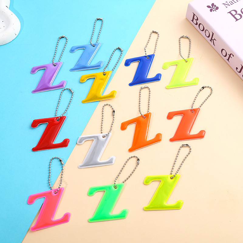 跨境字母Z12色反光警示挂件PVC骑行背包挂件夜间标识钥匙扣挂件