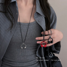 耳机吊坠项链女高级感ins风长款挂脖链仿金属衣服配饰长款毛衣链