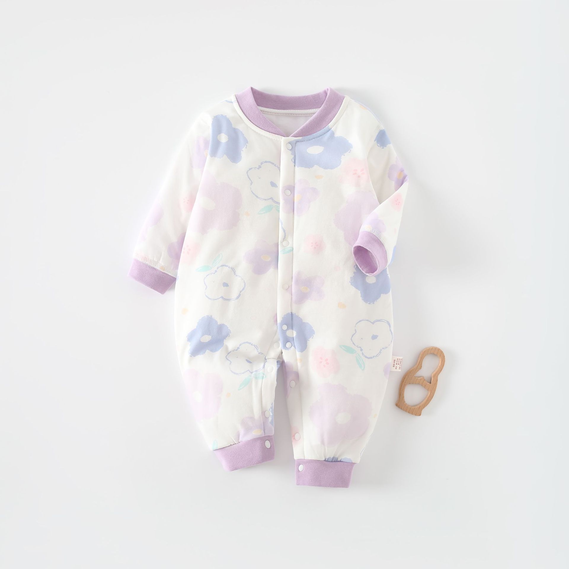 Ropa de bebé otoño y el invierno espesado 40g caliente mono deshuesado popular suave recién nacido clase un bebé acolchado mameluco