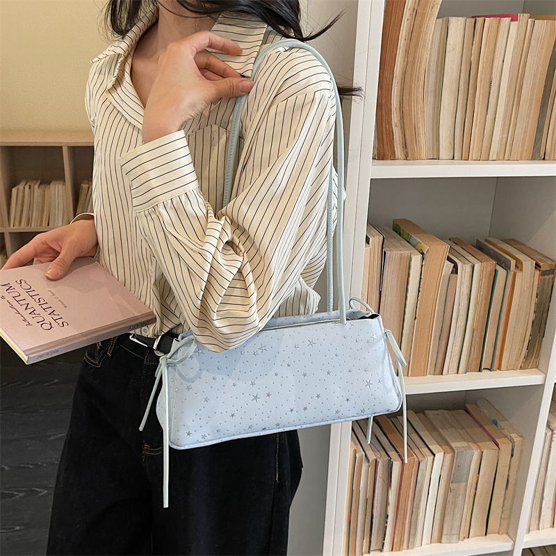 2026 primavera nuevo estilo de moda coreano lleno de estrellas de textura bolso de hombro bolso de mujer diseño de sensación diaria nicho bolso de brazo