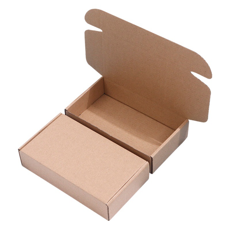 Caja de aviones T2 en stock expreso embalaje cartón fábrica directa pelo teléfono móvil Shell ropa caja de embalaje cartón corrugado al por mayor