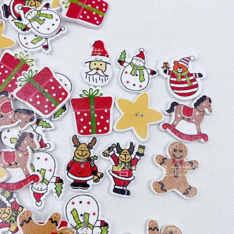 クリスマスの絵の木はサンタクロースの祝日の雰囲気の雪だるまを掛けて木のボタンのヘラジカの木のボタンを飾ります。|undefined