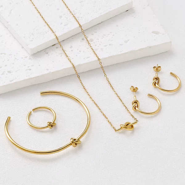 New cross-border titanium steel love knot pendant necklace bracelet earrings ring suit ladies niche all-match jewelry