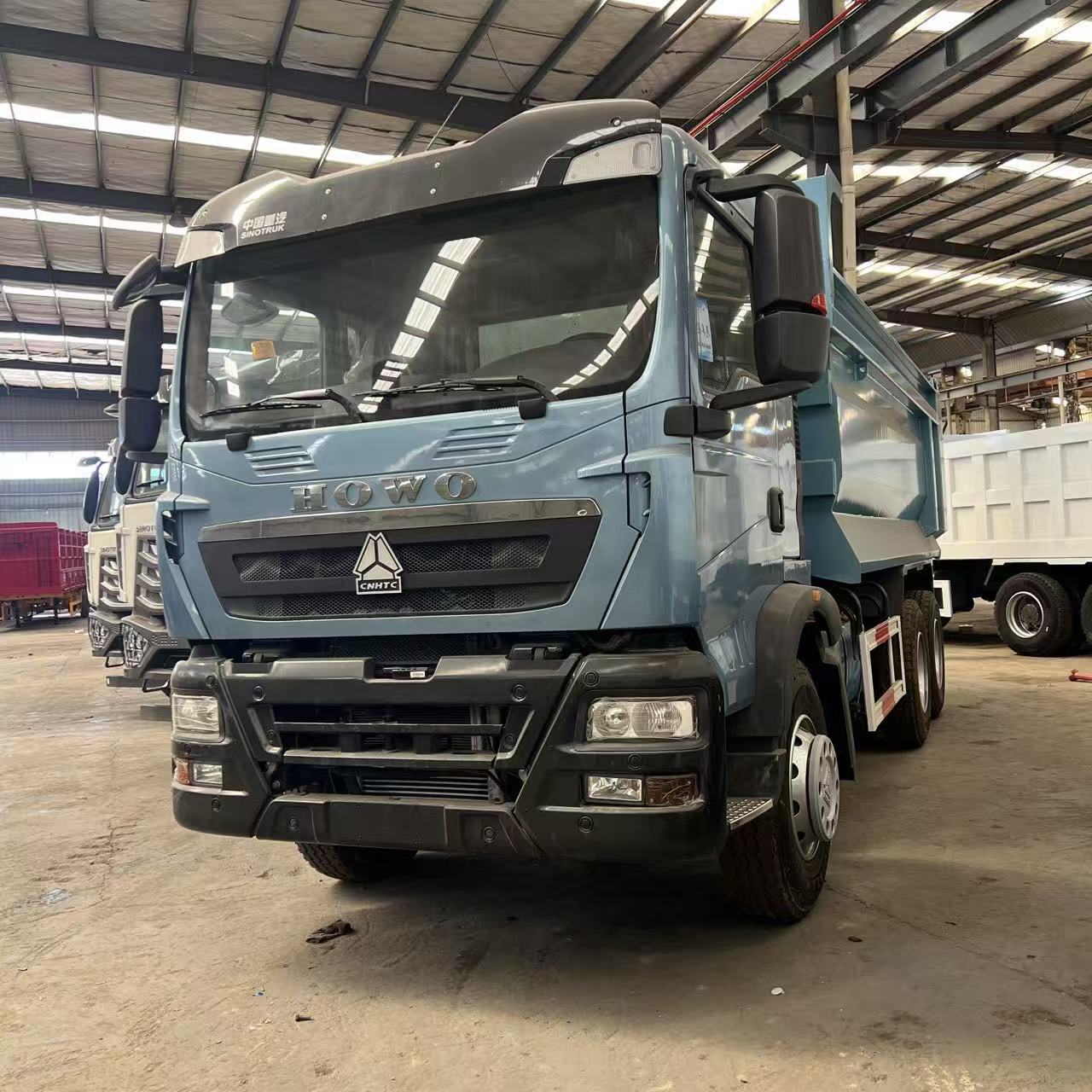 China Heavy Duty Truck HOWO TX dump truck, eight-wheel dump truck, mining and gravel engineering transport vehicle, exported to Africa