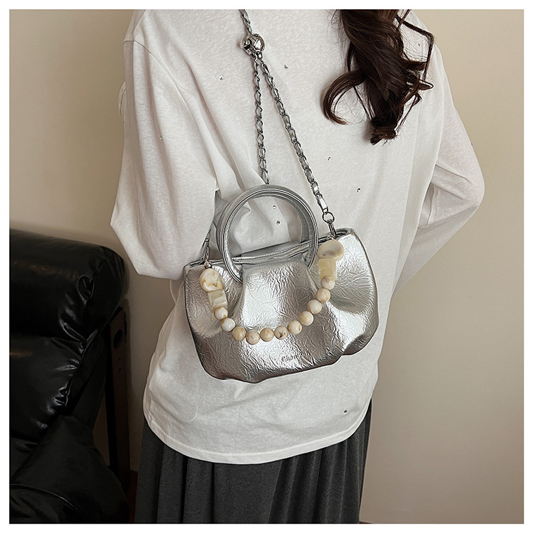 A stylish and trendy beaded bag for women, a new summer chain crossbody cloud bag for women in 2025 undefined