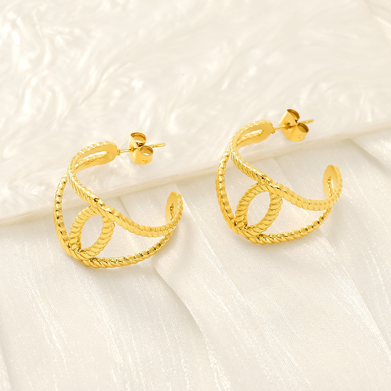 2024 nueva moda europea y americana, pendiente de diseño hueco geométrico de acero inoxidable, pendiente de temperamento simple y versátil, mujer