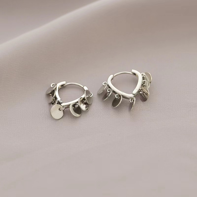 Brillante disco bordilla perilla femenina simple estilo modesto nuevo estilo personalidad versátil orejas de viaje diario