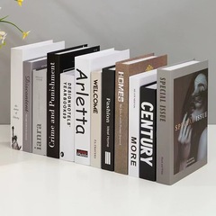 シンプルで現代的な北欧スタイルの偽の本の置物のシミュレーションの本の箱の写真を撮る模型の客間の事務室の装飾の本