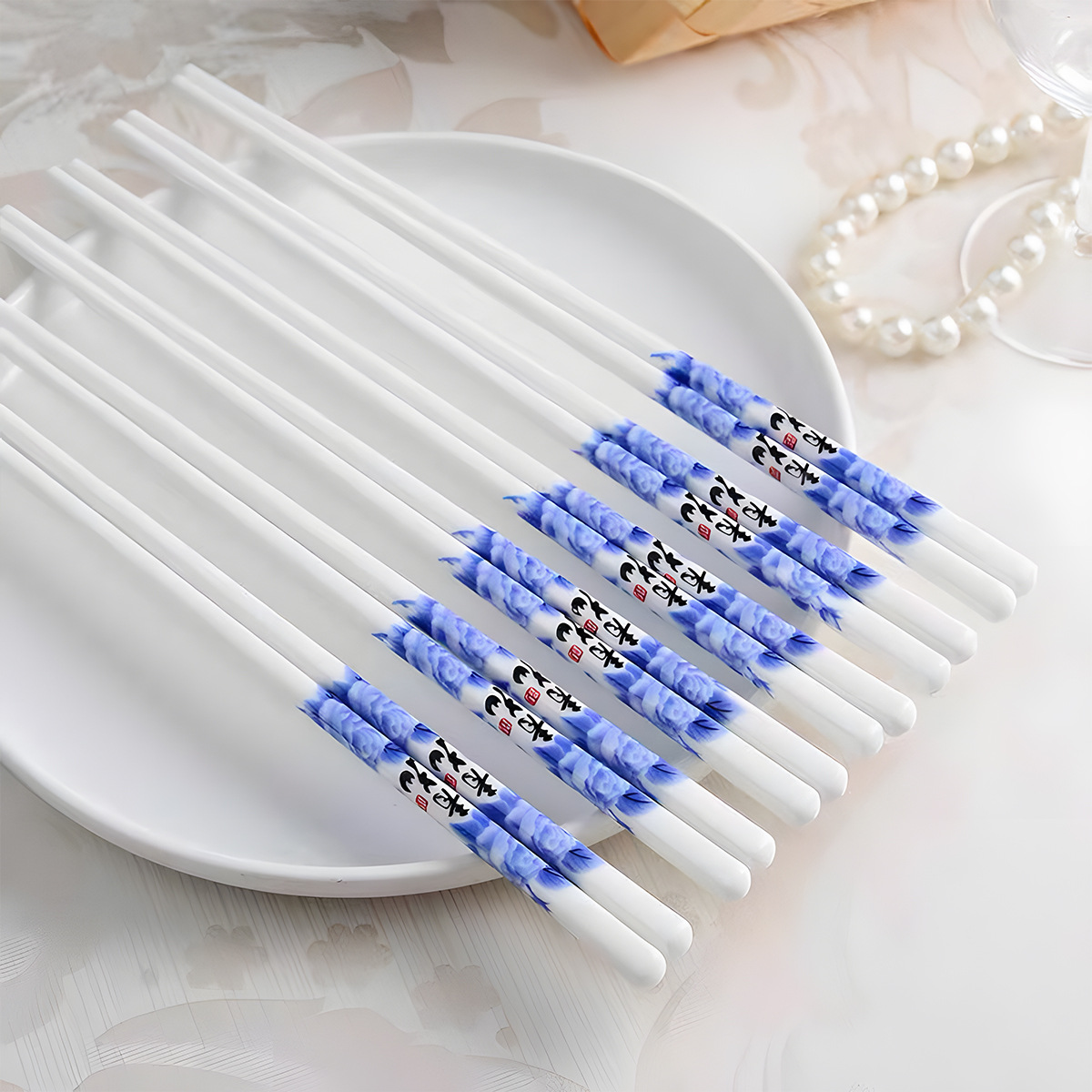 Palillos de cerámica azul y blanco, porcelana blanca, vajilla para el hogar, resistente a altas temperaturas, a prueba de moho y sin deformación, palillos de regalo al por mayor