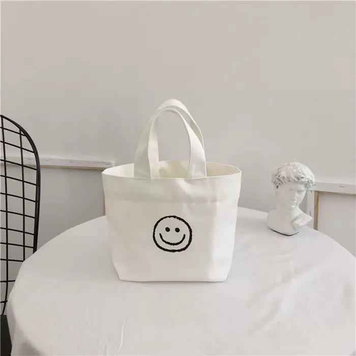 White smiley handbag 17*20*26