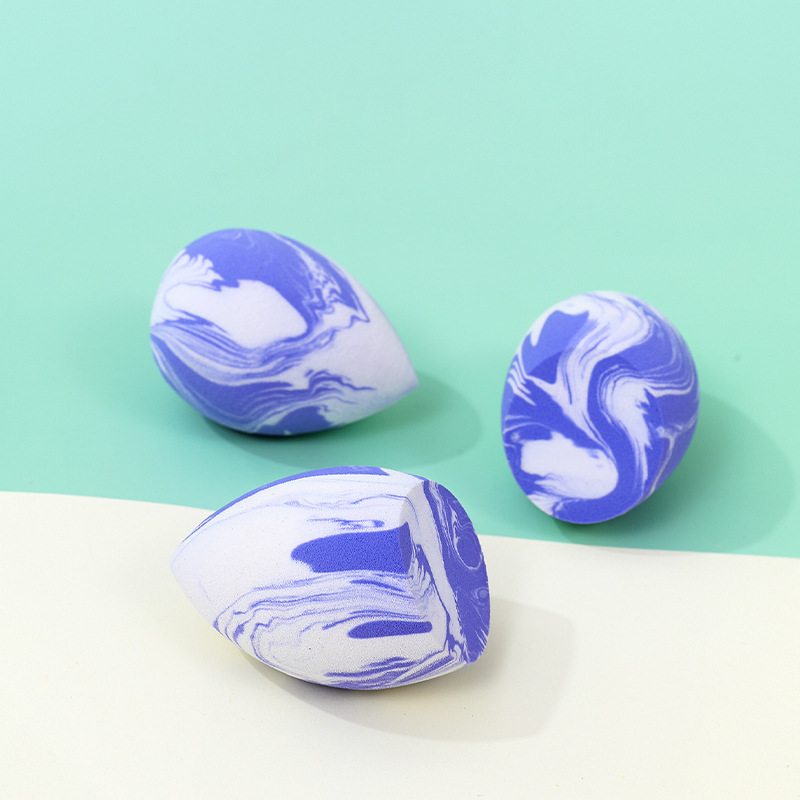Colores mezclados personalizados de fábrica gotas de agua maquillaje de belleza huevo soplo de polvo maquillaje transfronterizo en forma de calabaza esponja cojín de aire huevo de maquillaje sin látex