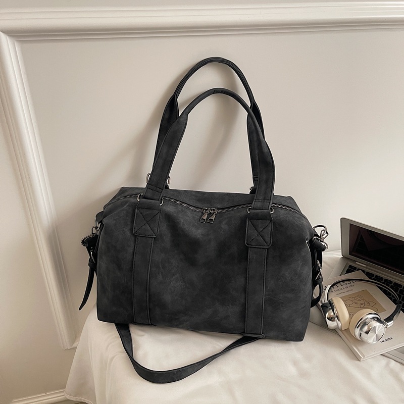 Bolsa de viaje corto de gran capacidad, bolso de mano, bolso de mano, mujer, 2025 nuevo invierno retro versátil, mochila de viaje