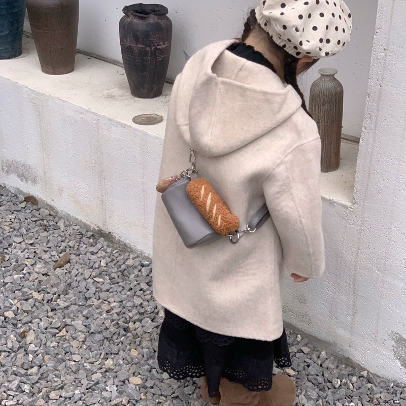 2025 otoño y invierno nuevo bolso infantil de moda coreana mini niñas bolso de peluche lindo colgante bolso cilíndrico
