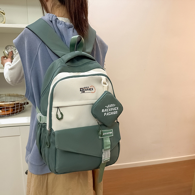 2025 primavera nueva mochila mochila de gran capacidad para estudiantes universitarios chinos tendencia transfronteriza linda mochila bolso para estudiantes