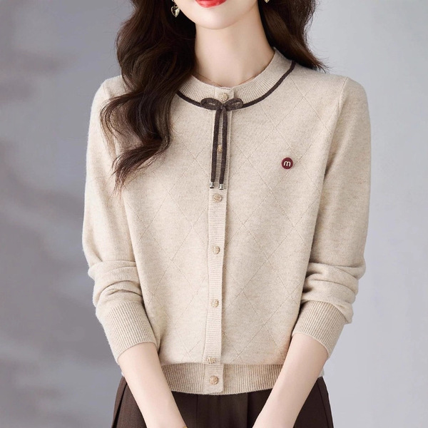 Autumn knitted cardigan with a round collar