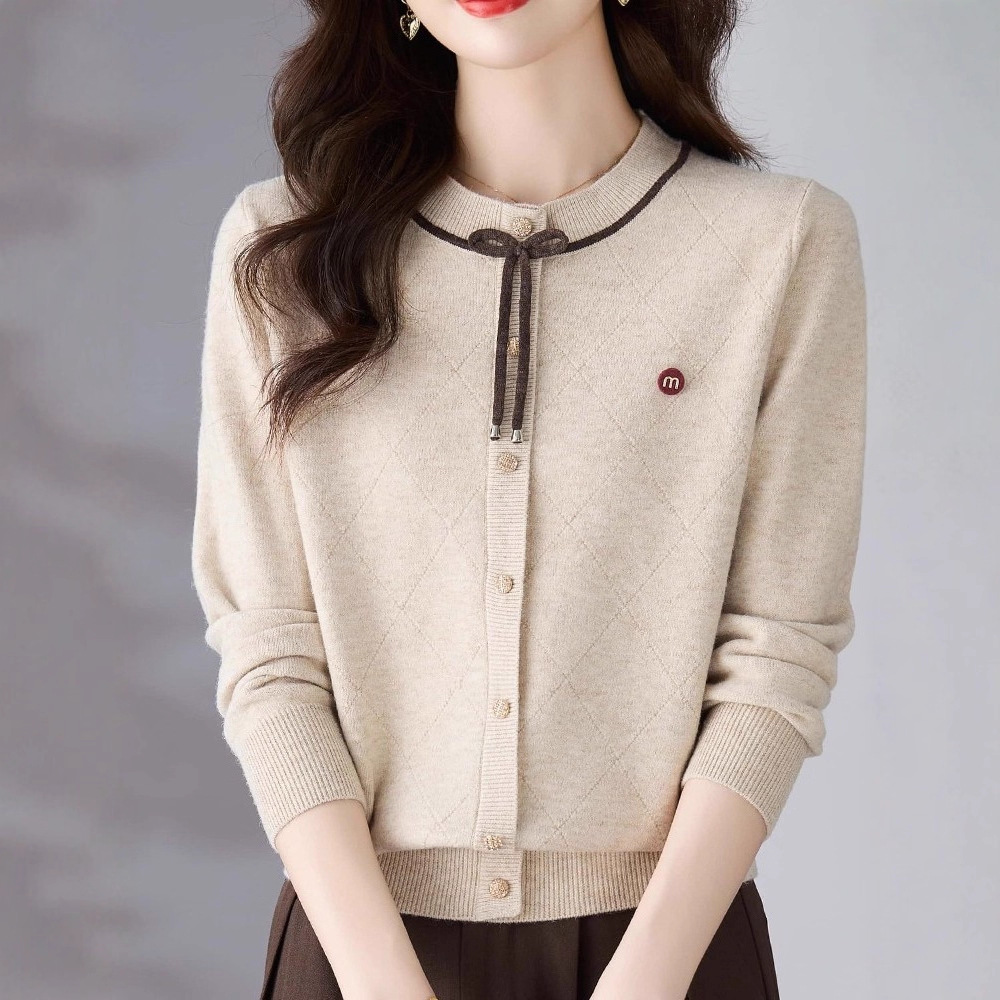 Autumn knitted cardigan with a round collar