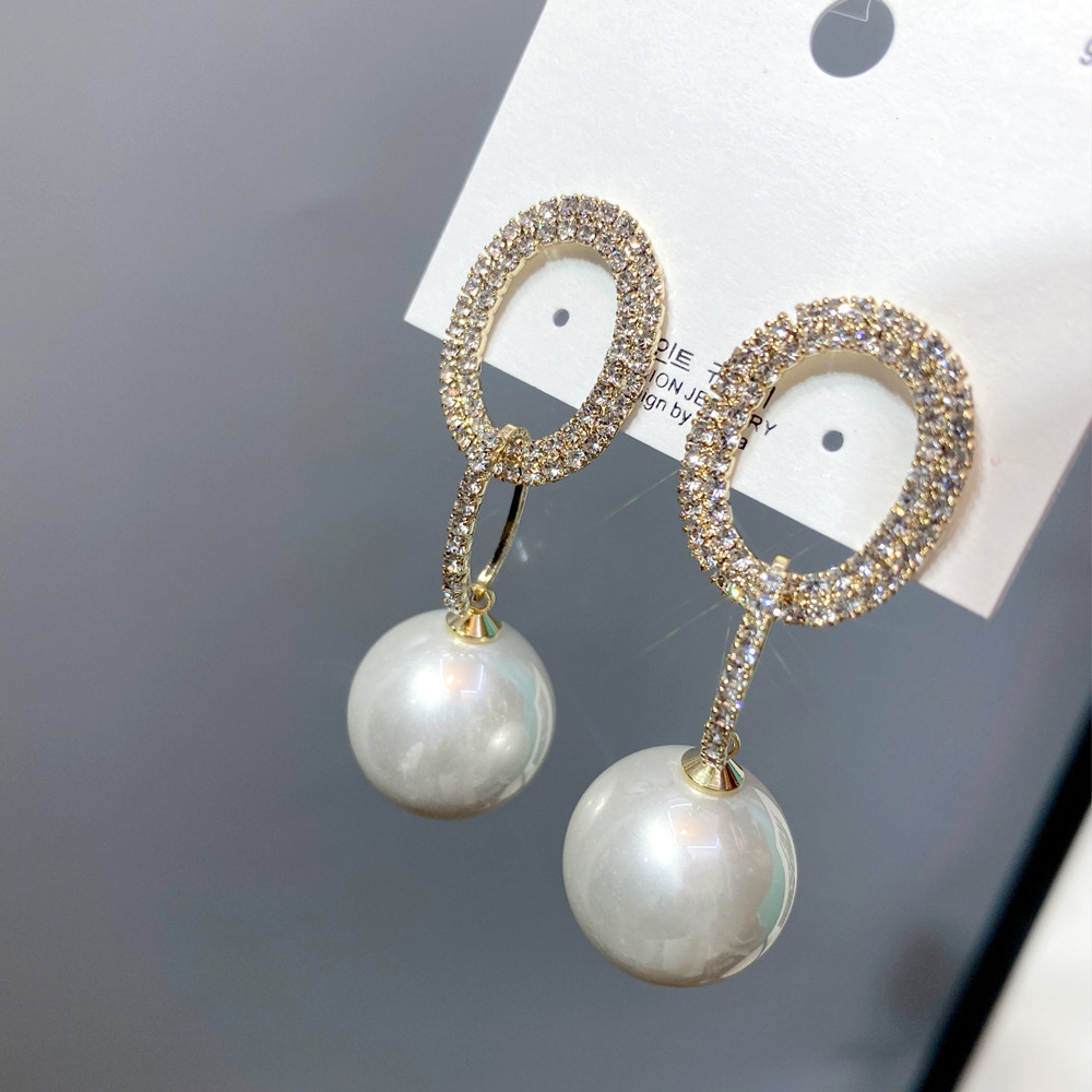 Fashion Full Diamond Pearl Stud Earrings display picture 12