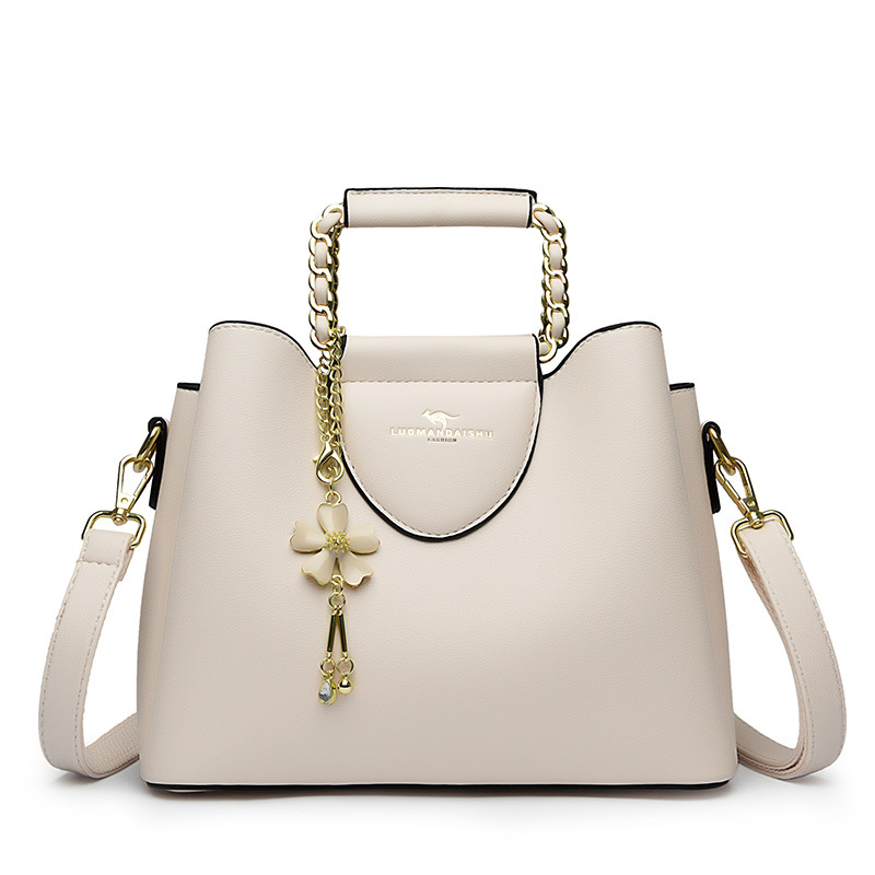 Nueva moda de hombro de las mujeres costura pequeño tamaño exquisito cubo bolsa de gran capacidad de cuero suave de una sola pieza de entrega para mamá más joven