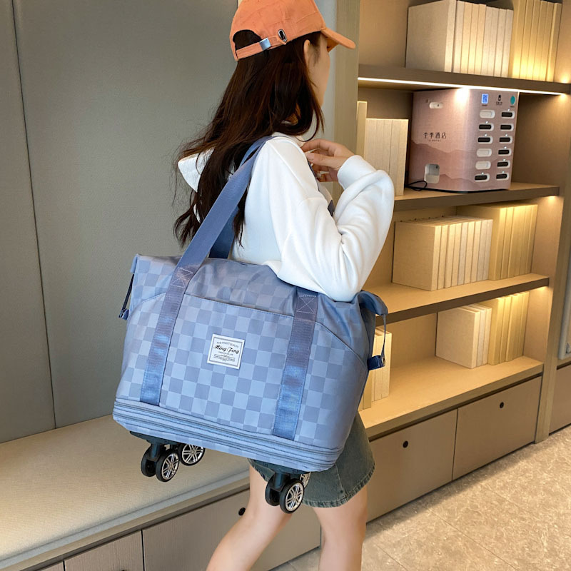 Bolsa de viaje con ruedas de gran capacidad, bolsa de equipaje de piernas largas resistente, bolsa de equipaje desmontable con ruedas universales al por mayor