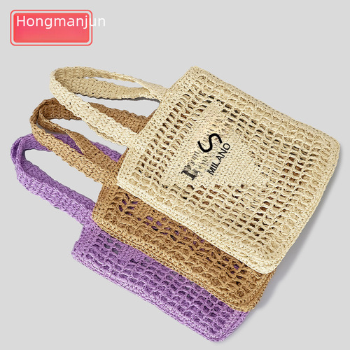 Spring and summer handmade woven tote bag for women: rustic-style hollowed-out design with embroidered letters, large-capacity straw shoulder bag—cross-border available