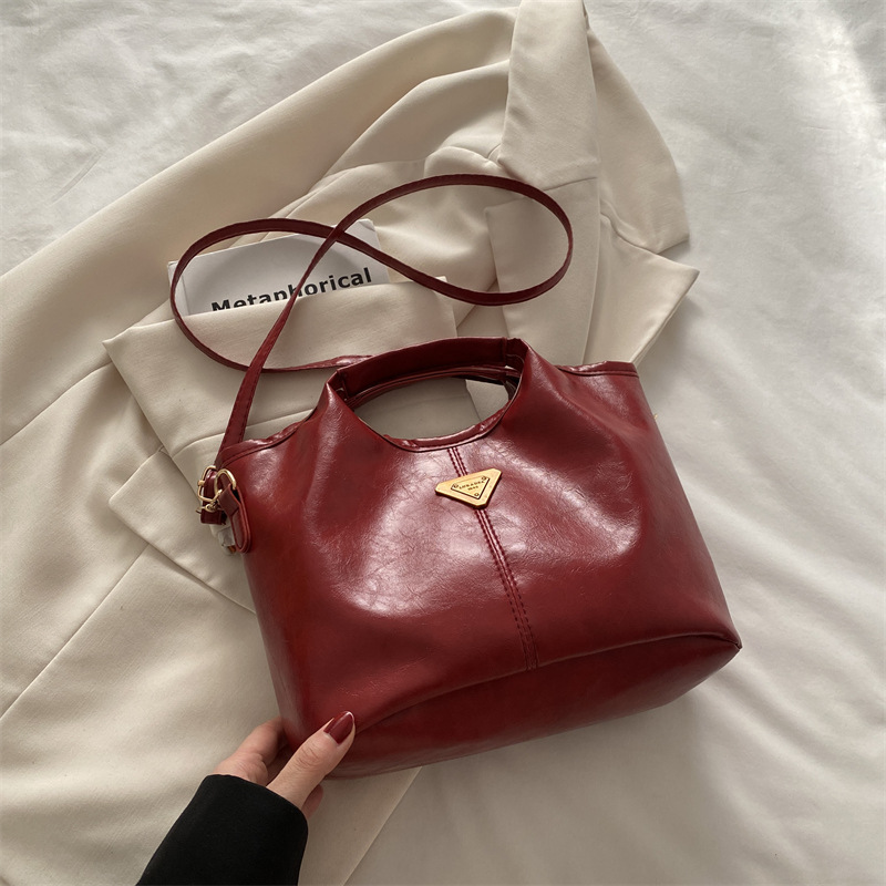 Otoño y invierno coreanos de alta calidad retro aceite de cera de cuero de moda bolso de mano nuevo estilo simple viaje mochila bolso de hombro