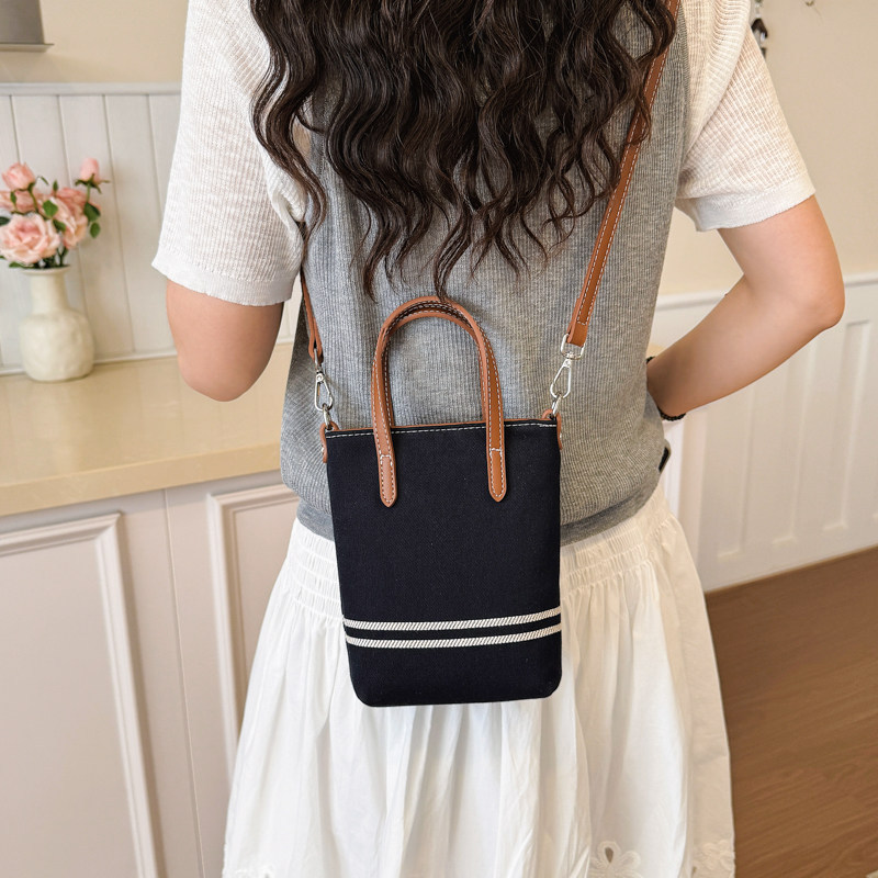 Pequeño bolso público de mujer rayas de hombro único cubo de agua móvil 2026 nueva moda de verano popular coreana