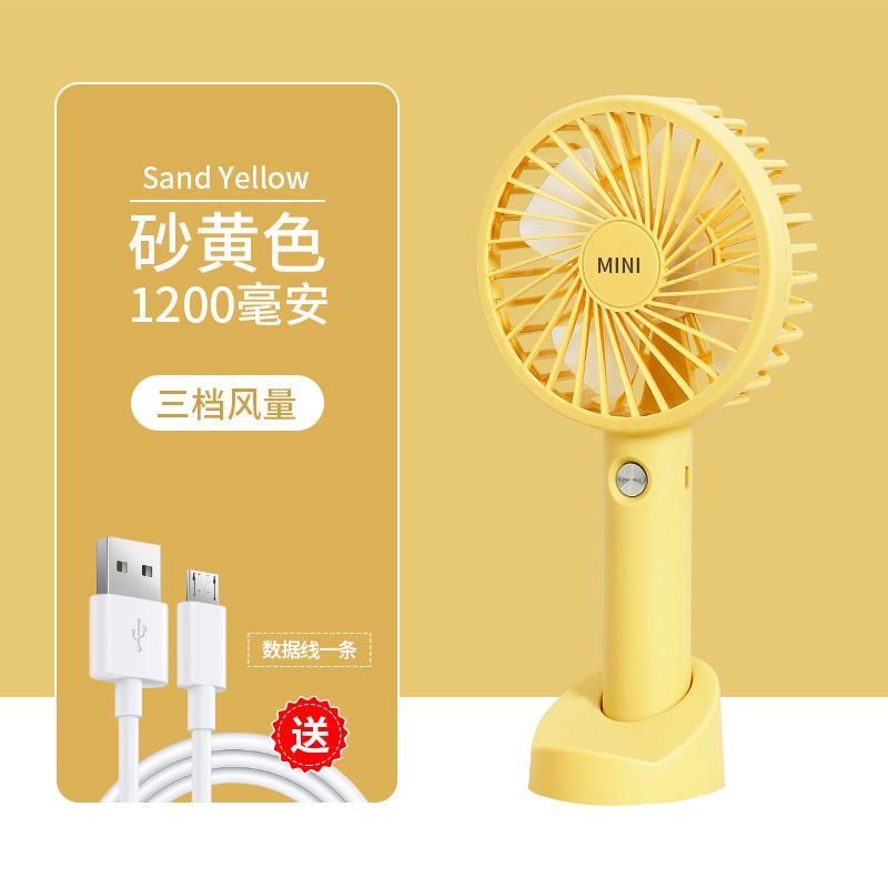 Ventilador portátil de carga USB portátil de escritorio de mano larga duración gran viento mini pequeño ventilador dormitorio de estudiantes