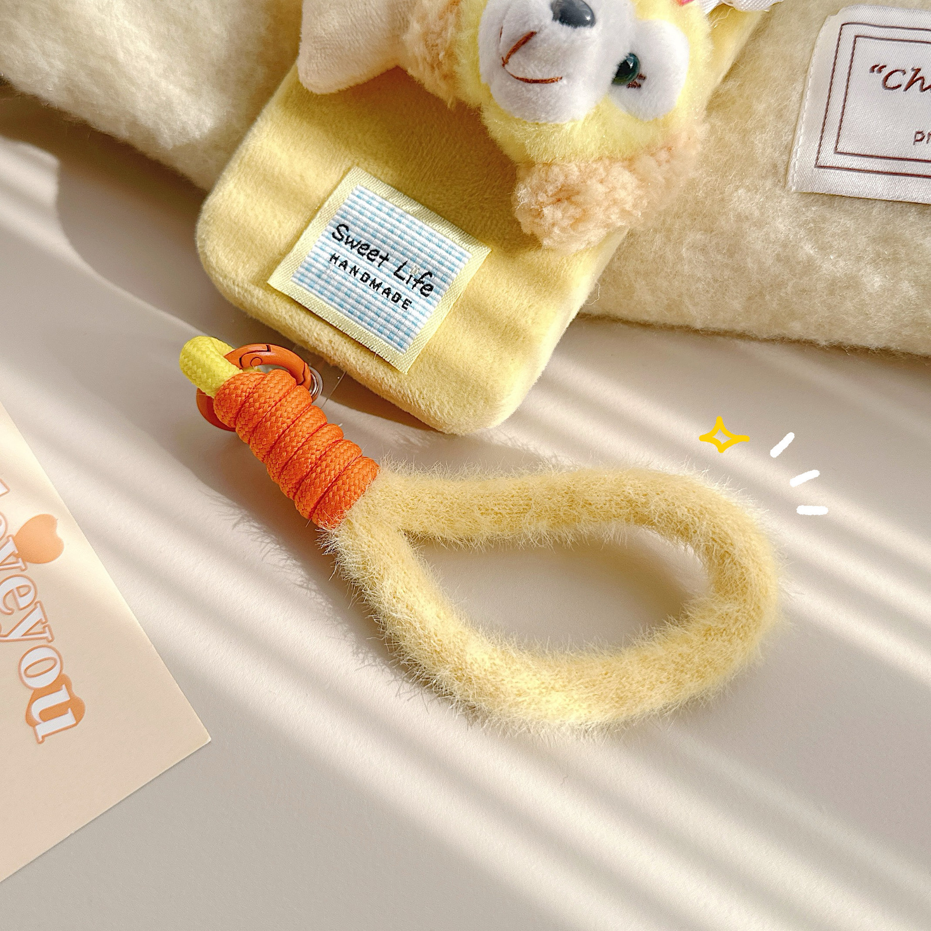 Otoño y invierno de peluche para teléfonos móviles colgantes de cámara de color llavero anti-perder pulsera cuerda bolsa trenzada corta colgante