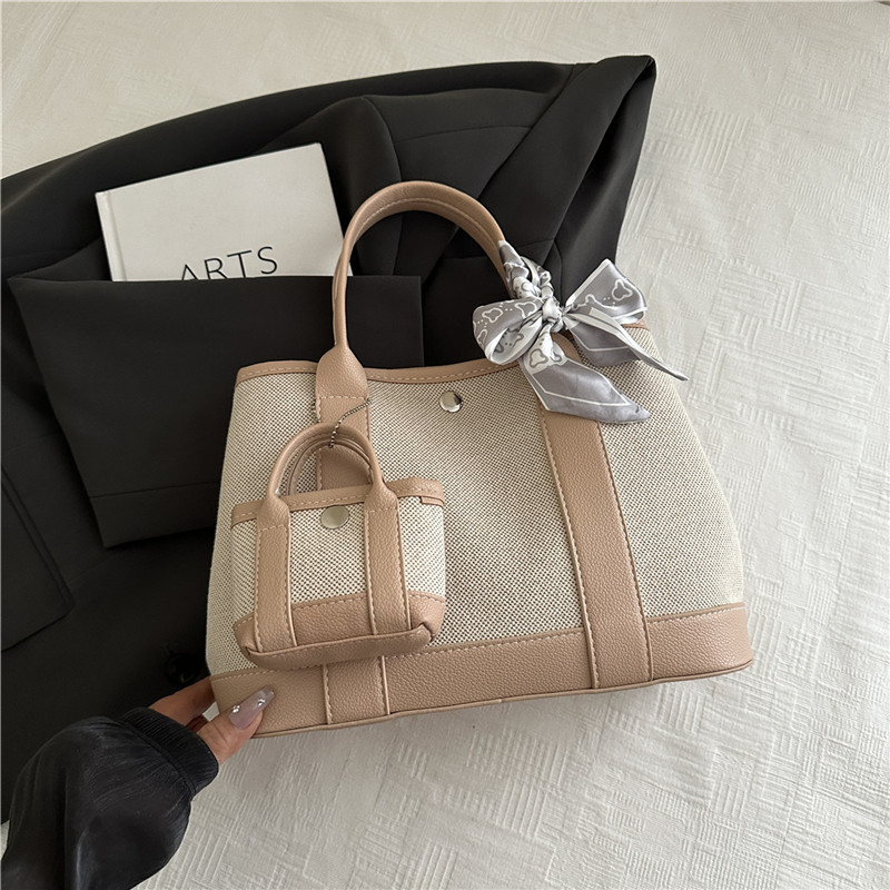 2025 nuevo bolso de lona para mujeres gran capacidad sen-meng simple otoño hombro portátil bolso especial para estudiantes universitarios