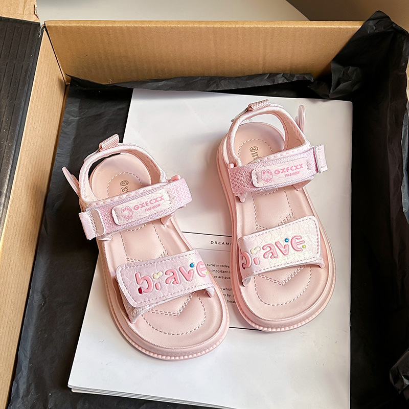Zapatos de princesa huecos de dedo abierto para niñas 2026 verano nuevo estilo para niños con suela suave de moda versátil zapatos de playa deportivos zapatillas frías