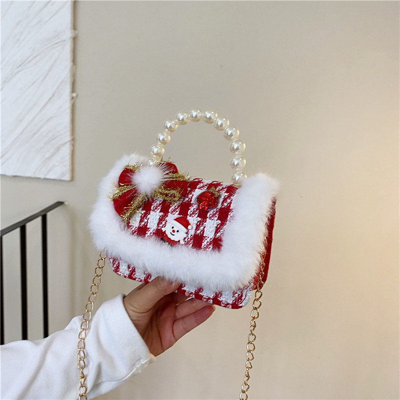 Mini moda para niñas bolso de cambio de perlas 2024 nuevo patrón de moda coreana bolso de ropa infantil
