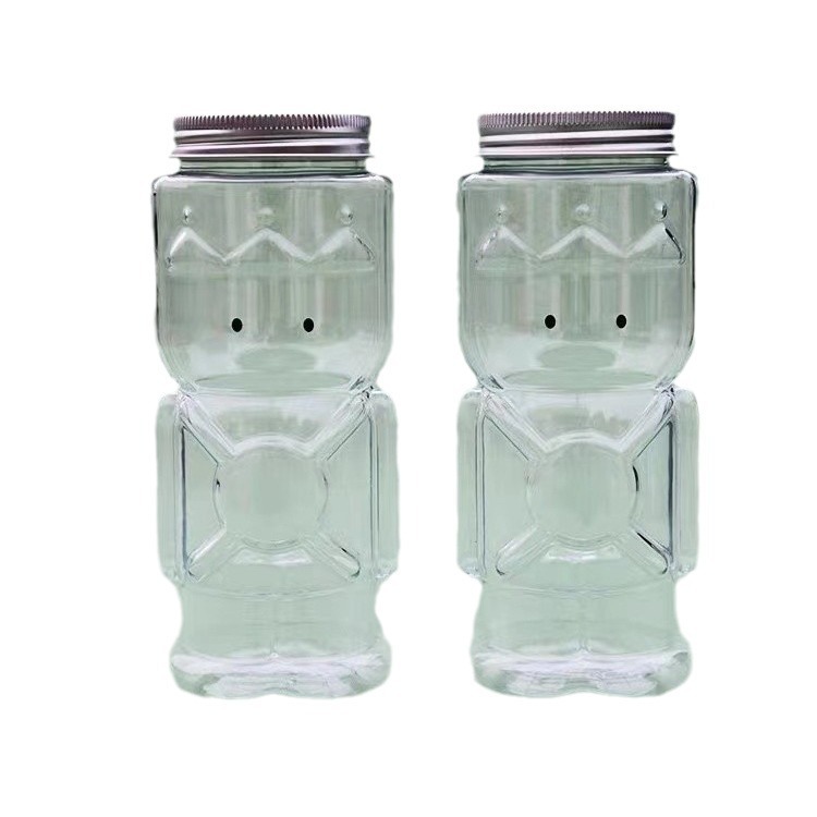 Neto rojo agujero abierto tapa lindo jugo botella de forma especial protector de la botella mascota transparente de dibujos animados botella de plástico botella de té de leche desechable