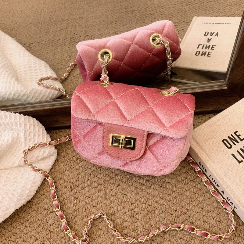 Bolsa de hombro coreana de niñas de terciopelo fragancia de color sólido mini mochila de bebé 2025 nuevo bolso de cadena para niños