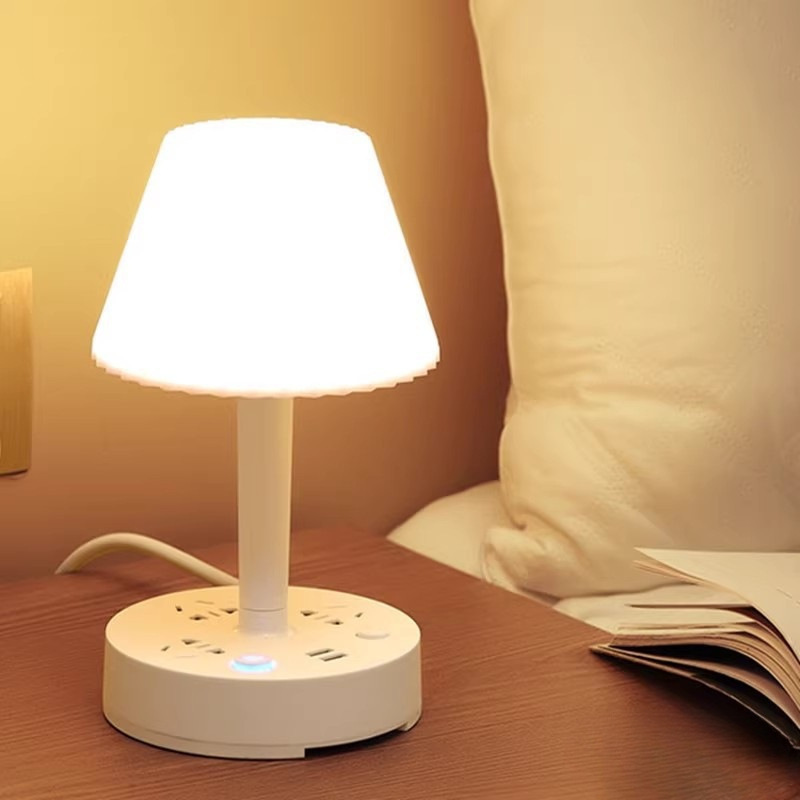 Lámpara de escritorio multifuncional enchufe de lámpara de cabecera protector de ojos integrado luz de cabecera de cama multi-engranaje luz fría y cálida doméstica LED lámpara de dormitorio al por mayor