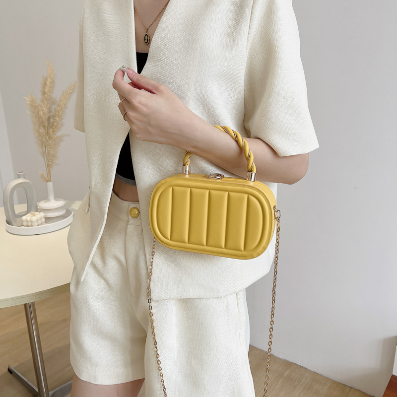 2023 new Korean style fashionable vertical strip embossed box bag high quality twisted hand chain shoulder crossbody bag_voghion.com