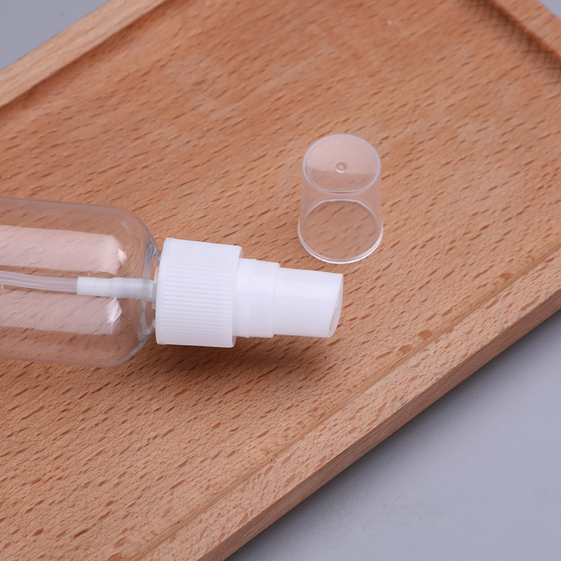 Botella de spray 30/50/100ml Botella de spray lateral transparente PET Botella de spray hidratante de alcohol pequeña Botella de spray de niebla fina portátil