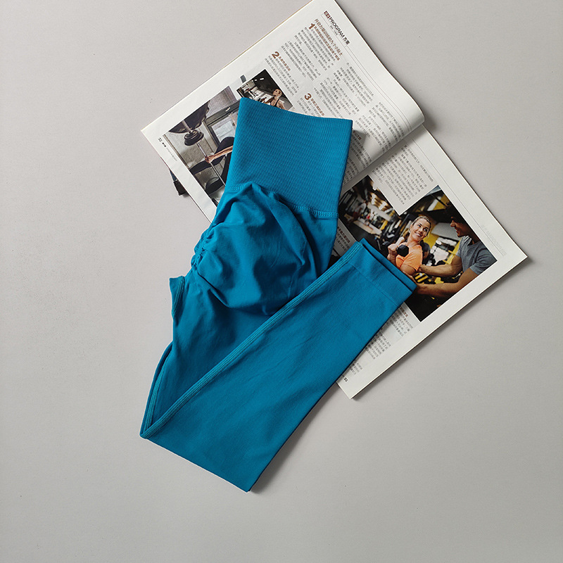 Pantalones de gimnasio sin costura europeos y estadounidenses, cintura alta, abdomen, caderas, pantalones de melocotón para correr, yoga, leggings apretadas