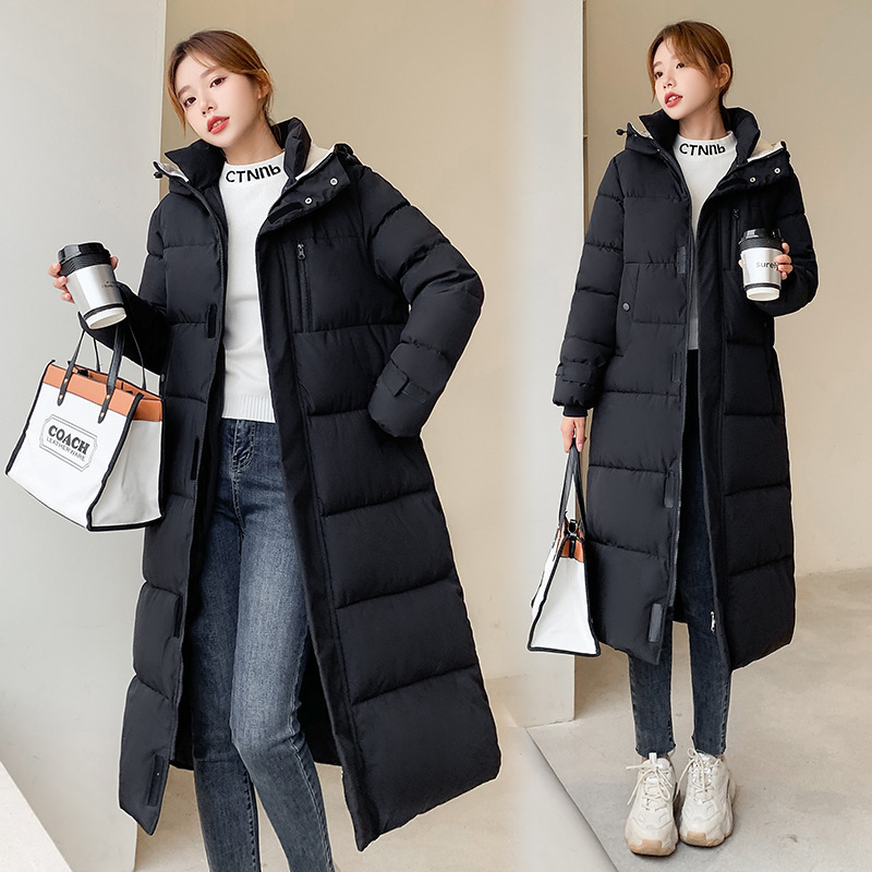 Nuevo comercio exterior 2023 ropa de algodón coreana mujer invierno largo encapuchado rodilla ropa de algodón damas gruesa abrigo de algodón blanco