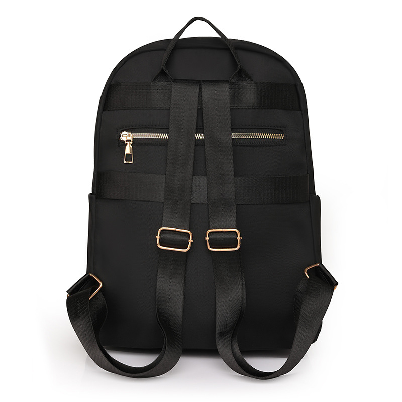 Bolsos para mujer 2024 nuevo bolso de nylon para mujer de color sólido para mujer simple y versátil mochila ligera para exteriores al por mayor