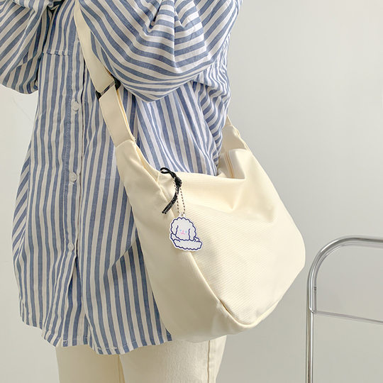 Korean style versatile student ins Japanese Harajuku simple waffle casual artistic one-shoulder crossbody solid color dumpling bag