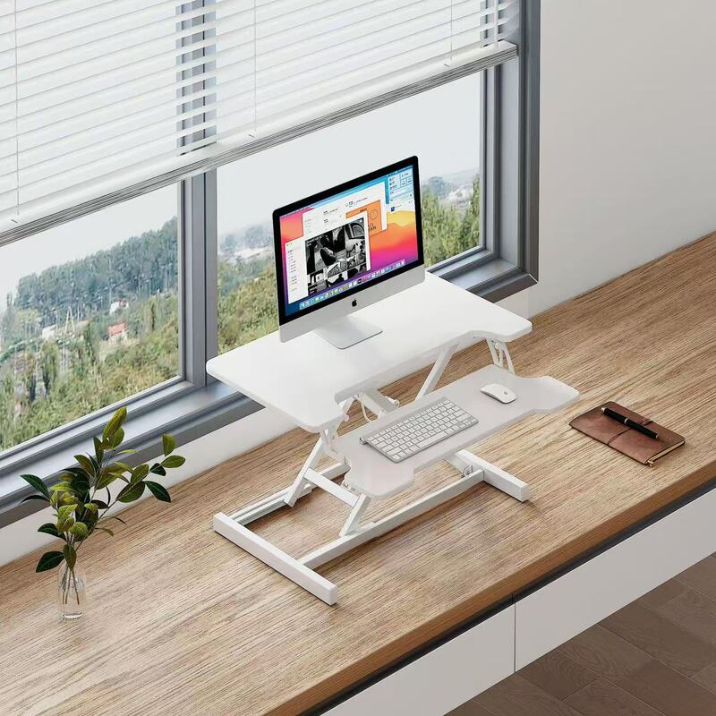 立っているデスクの昇降コンピュータの机の折り畳みの机の上で気動のタイプのデスクトップはノートの小さいテーブルを高く上げます。|undefined