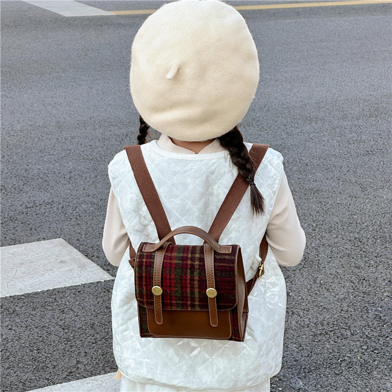Mochila transfronteriza para niños nuevos europeos y americanos retro estilo británico para hombres y mujeres bolsa mini mochila portátil de jardín de infantes