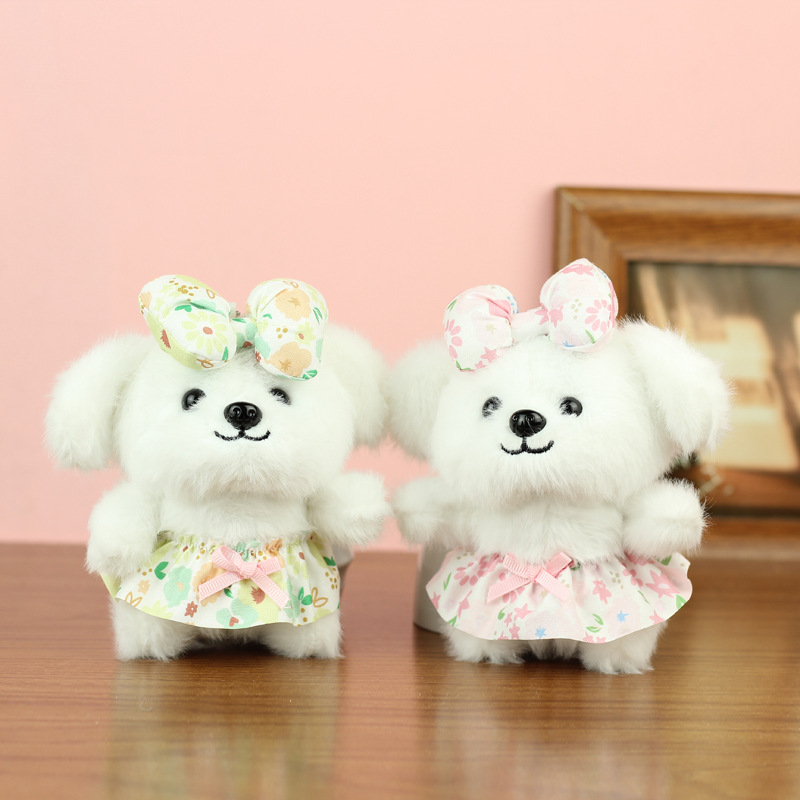 Linda y linda falda floral colgante de perro de juguete de peluche de dibujos animados muñeca de perro bolso de escuela colgante muñeca muñeca pequeña