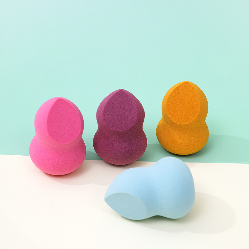 Fábrica personalizada cortar un cuchillo de polvo de maquillaje de huevo no comer polvo en forma de calabaza de poliuretano esponja de maquillaje de huevo de maquillaje
